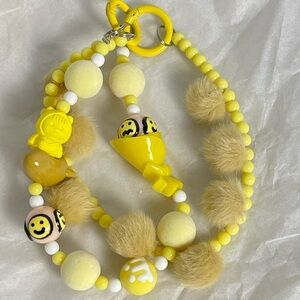 Yellow and White Beaded Accessory